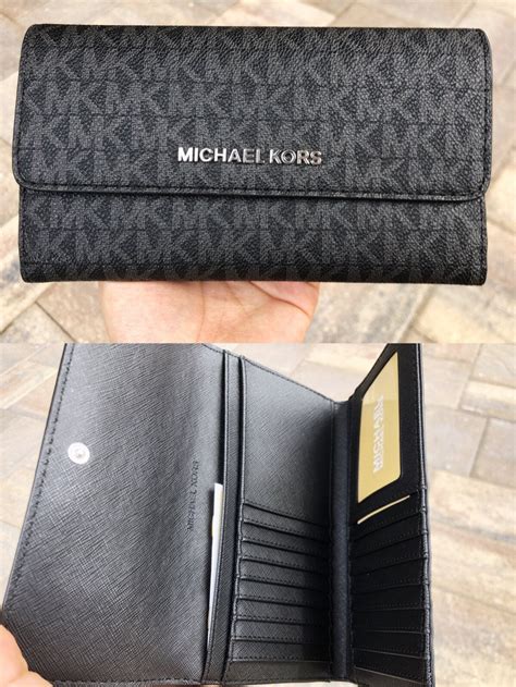 michael kors tri-fold black wallet with silverhardware|Michael Kors trifold wallet.